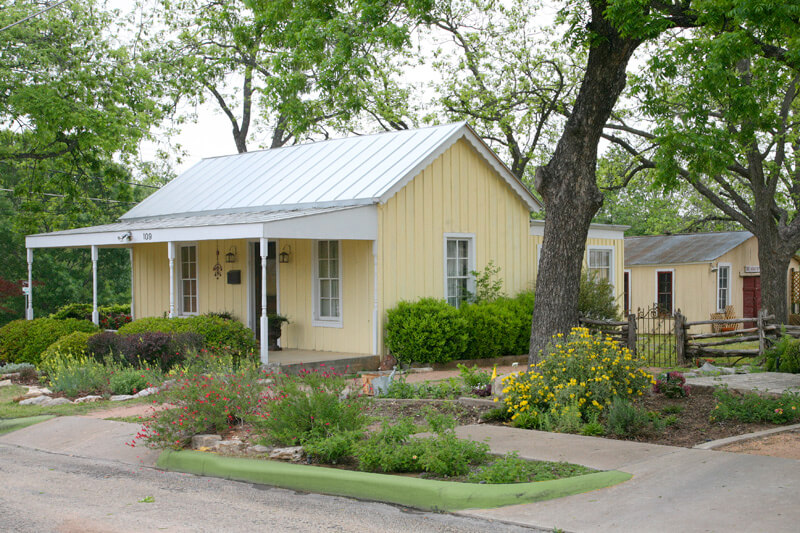 Exterior view of Cosette's Cottage Bed and Breakfast / Flickr / Tammy Sikes
Link: https://flickr.com/photos/absolutecharm/4464486631/in/photolist-7NAE5U-7NvXvv-7NvCQM-5FqY9B-7NmH64-6jPkxJ-7NvXAT-7NvW5V-7NvXcn-7NvV68-7NADF3-7NvXPc-6YtK4r-7NwEhR-7NwEua-7NzVQq-7NvEqg-7NzVCj-dnwid-7NzDUo-5AkMwB-3qduKa-7NkW6Z-7NvCxZ-7NAEe9-7NvDF8-7NzF9d-7NzDiS-7NvEkr-7NvD9z-23W94dY-9KGFxL-7NvFxc-7NzENE-2j5LcV-23W93Yj-5M74Hv-ZrBjVp-21Kc4Gh-24X8wof-23W94p9-23DLLbk-23W94a1-7NvDGv-7NzWLm-7NAEd7-7NvUnB-7NmH7V-7NzVq1-23W93Nu