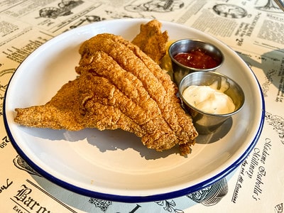 Fried Fish at Gatlins's Fins and Feathers /Flickr / Houston Foodie
Link: https://www.flickr.com/photos/houstonfoodie/52277931775/