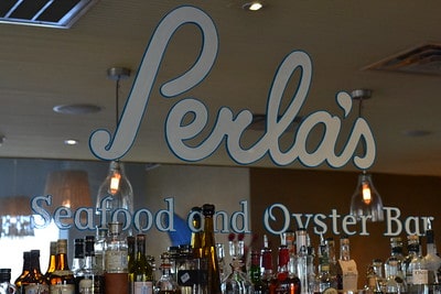 Front View of Perla's Seafood and Oyster Bar / Flickr / forkistry
Link: https://www.flickr.com/photos/61187437@N02/5588676493/
