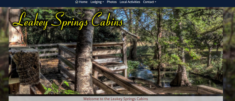 Homepage of Leakey Springs Cabins / 
Link: https://leakeyspringscabins.com/