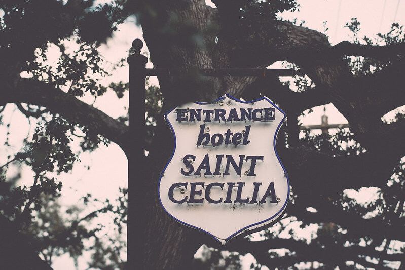 Entrance sign of Hotel Saint Cecilia / Flickr / Nan Palmero
Link: 
https://www.flickr.com/photos/nanpalmero/12890244444/in/photolist-97FknZ-kD4SzS-kD3EB6-kD3CFx-7D6ioH-kD4UjU-kD2udc-kD44H4-kD54Pf-kD2PFa-kD56m3-7D6n62-7Da96b-7D6mTx-7Da8FC-cPiQD7-7Dac3b-7D6nEp-6a15bY-cPiQkd-cPiQim-cPiQwm-cPiQyC-cPiQFj-cPjwEw-2giUByT-X7ZAXZ-2giUi11-2giUASC-2giU8CX-2giUB5w-qu95UU-qugTBK-2giUhEB-X7ZzXT-2giUh4w-2giU7P2-2giUAVt-dZ9fLW-pPGmm9-2giU8jk-2giU7U2-2giU8vN-eK8fca-2giUhWo-69a5W3-dZ9fny-7CTnqs-2giUhai-2giU7WM/