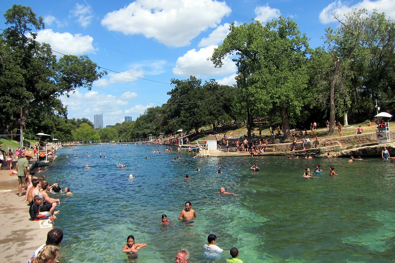 A view of  Zilker Metropolitan Park / Flickr / Wally Gobetz
Link:
https://www.flickr.com/photos/wallyg/8059497009/in/photolist-dhc2EZ-dhc2kC-dgRnMS-dhc28u-dhc2bN-dhc2Nt-dhc2Jv-dhdJtL-4pz4Q3-5v1xMZ-4pz4LE-4pz4NA-4pz4vu-5v5UfW-4pv25k-dhc9vp-4pz4zf-5v1xNt-jvh46e-5v5UeC-4pv1rZ-QJHst4-jvirvv-36tkW4-jvjiiN-QRHsdN-jvkDTf-QRHqW9-Qm12fS-QG4gmU-QRHFg1-Qm137m-QVaDTk-QVaTbH-PFyZ1T-QG42FC-Qm1cXd-QG4iJj-PFz2Lx-PCPmoJ-QVaF5Z-QG4mn5-QJHxmv-QVaSH8-PCPeCj-QRHEr5-Qm1efd-QJHeKZ-PFz1Ya-PFyWW2