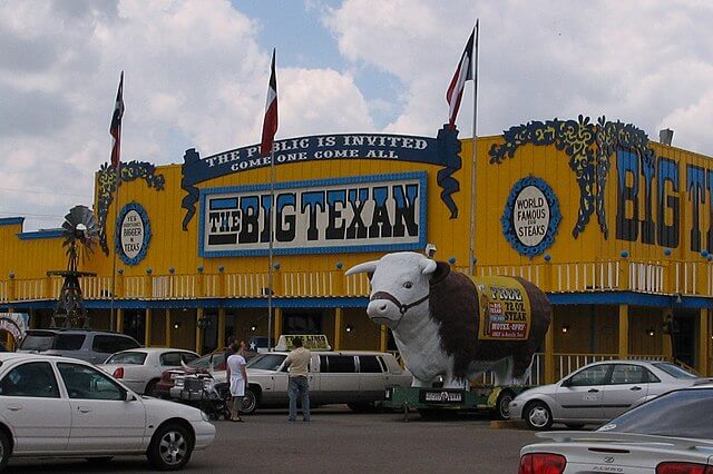 Front view of Big Texan Steak Ranch / Wikipedia / Who What Where Nguyen Why a/k/a Anonymous Cow / 
Link: 
https://en.wikipedia.org/wiki/The_Big_Texan_Steak_Ranch#/media/File:Amarillo_Texas_Big_Texan_Steak2_2005-05-29.jpg